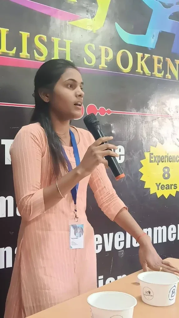 Student speaking with a microphone